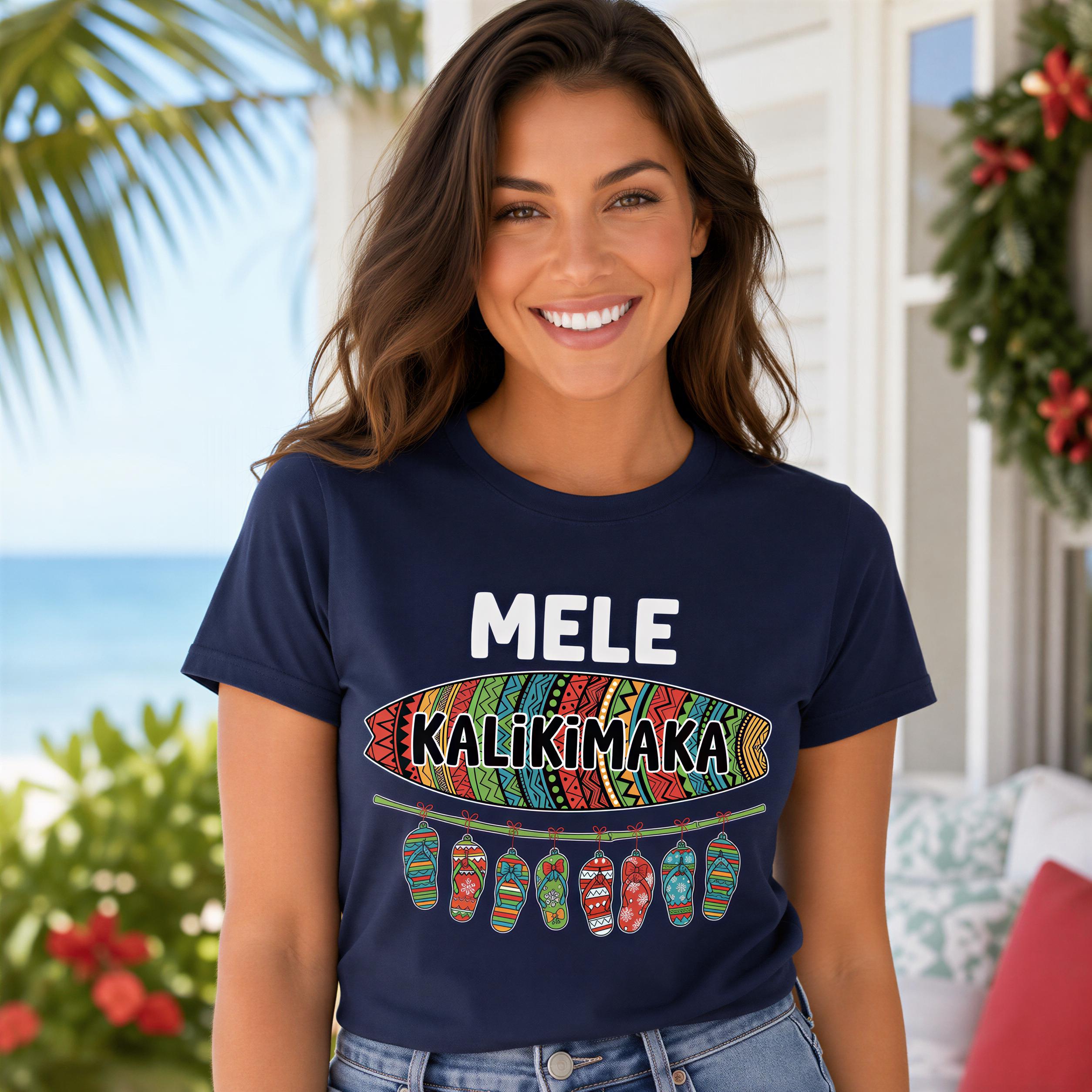 A woman wearing a navy blue t-shirt with a colorful graphic and text, smiling at the camera.