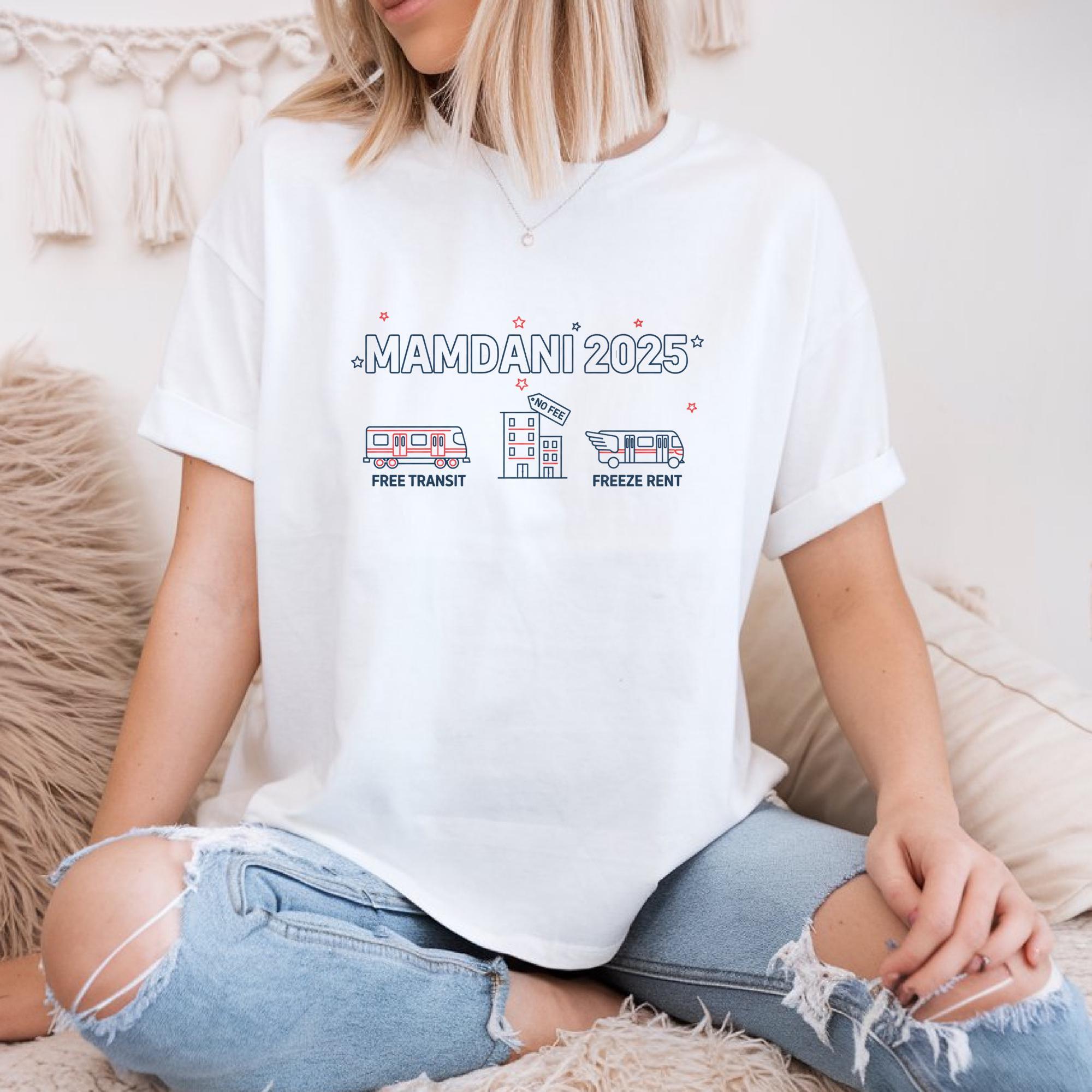 A woman wearing a white t-shirt with text and illustrations related to transportation and travel.
