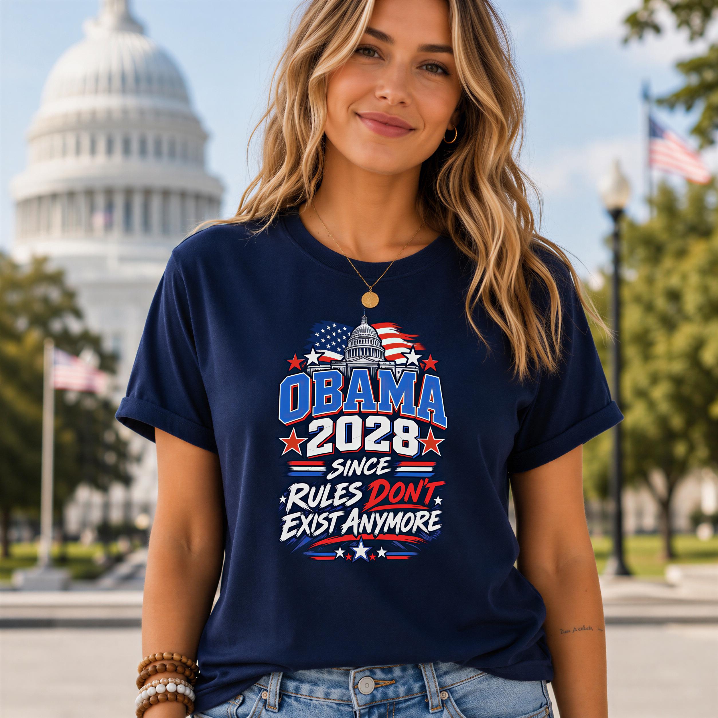 A woman wearing a navy blue t-shirt with a political message printed on it, standing in front of the United States Capitol building.
