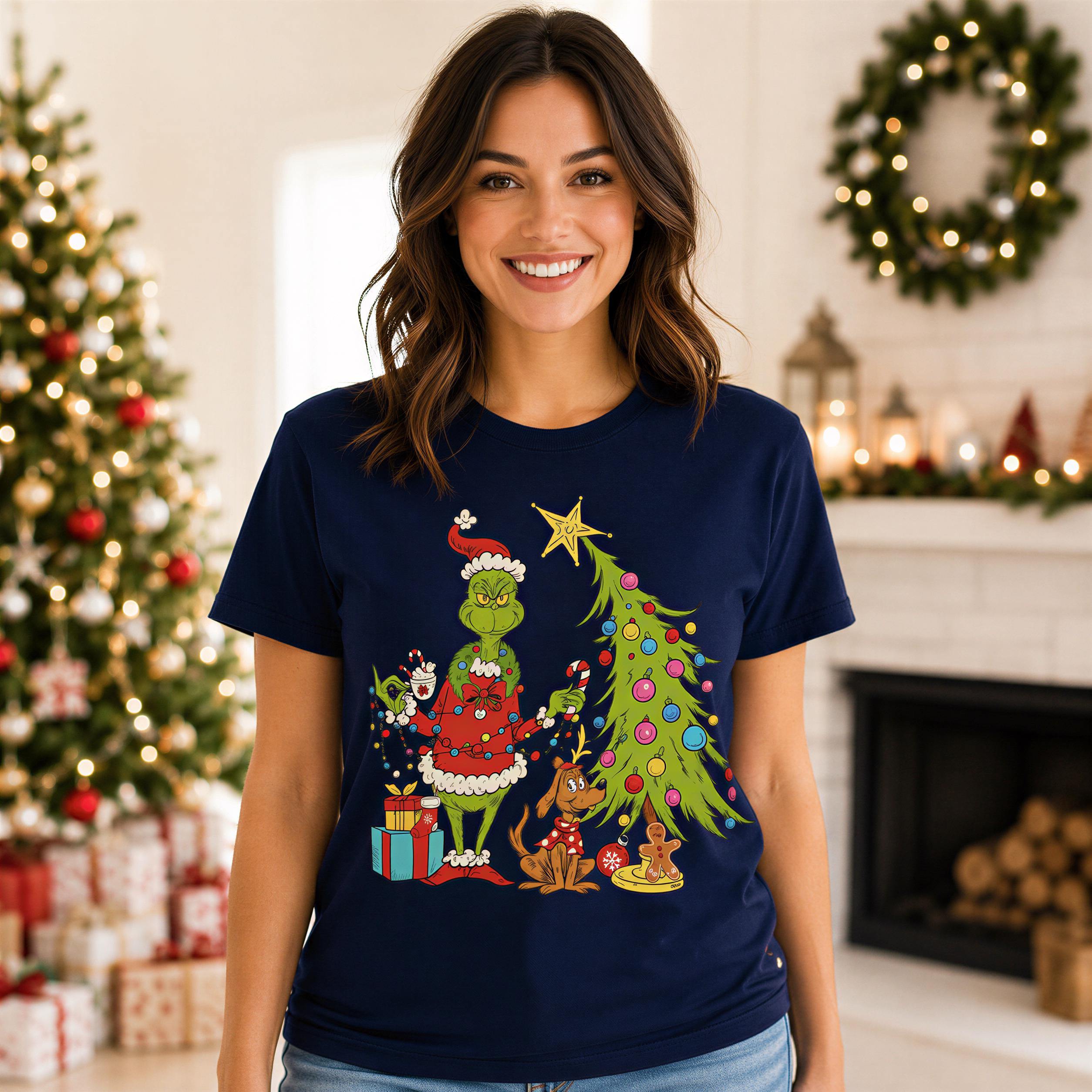 A woman wearing a navy blue t-shirt with a Christmas-themed graphic of the Grinch and his friends.