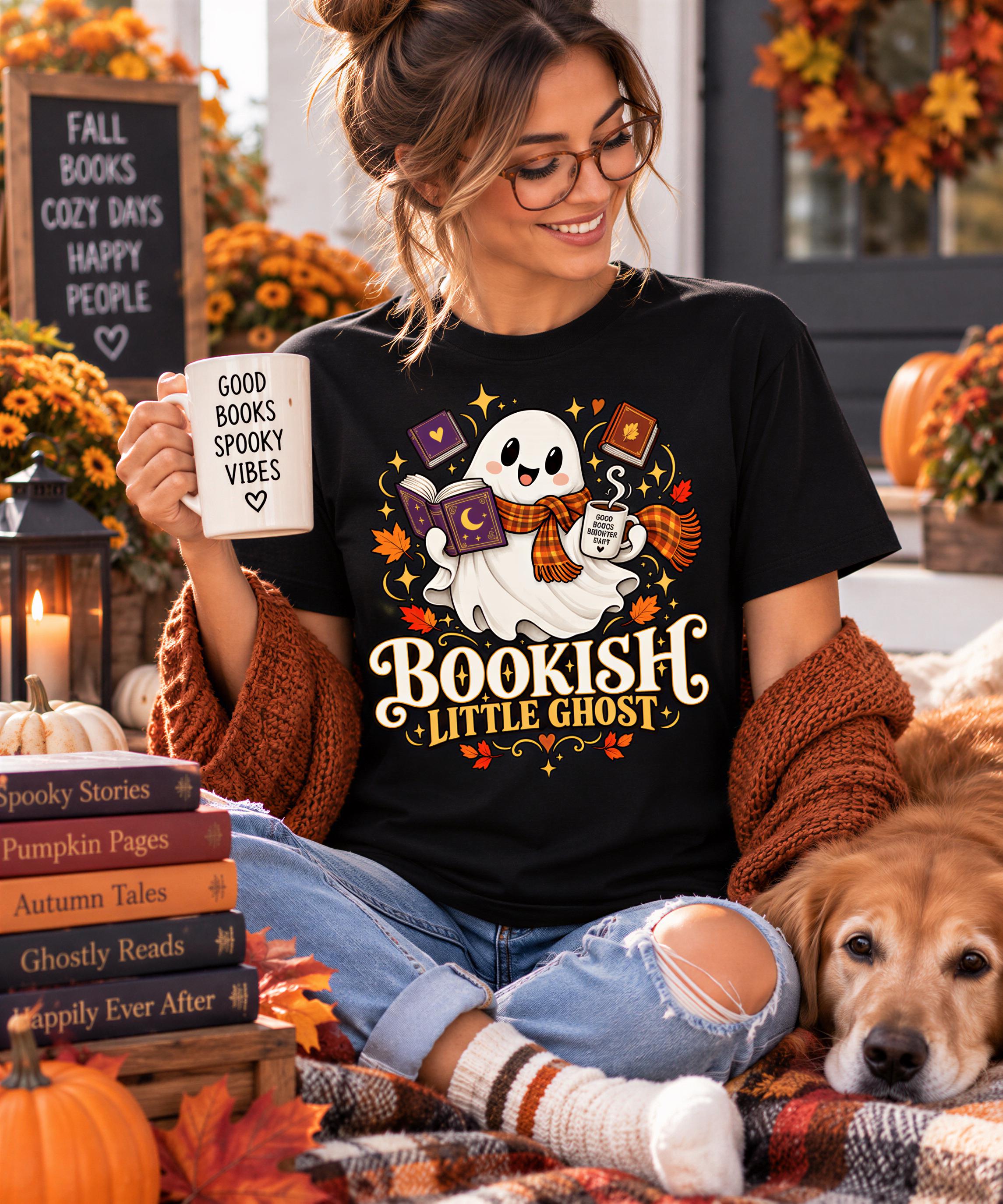 A woman sitting on a blanket with a dog, holding a mug and surrounded by books and autumn decorations.