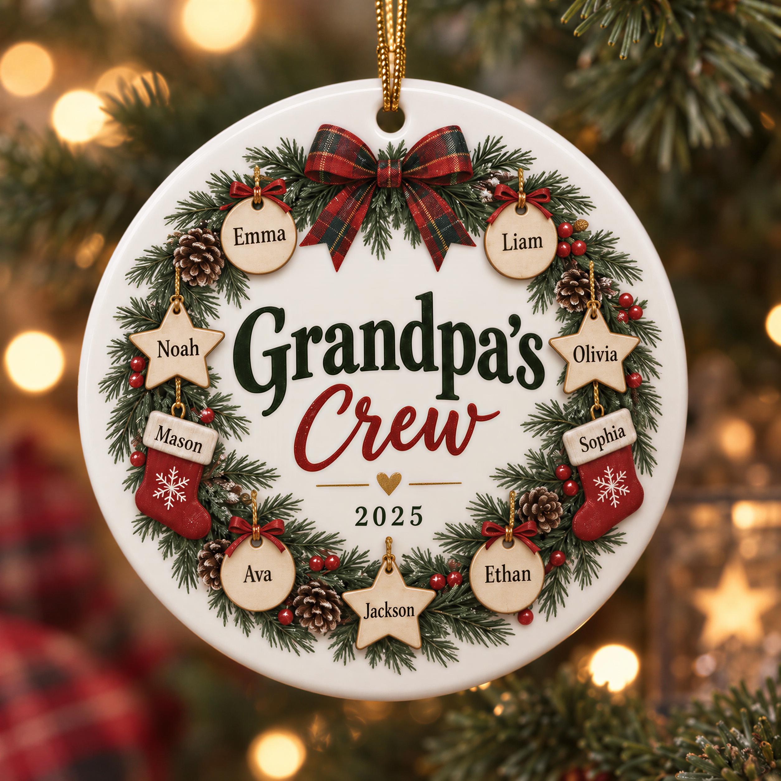 A white ornament with a wreath design, featuring the names of several family members and the year "2025" on it.