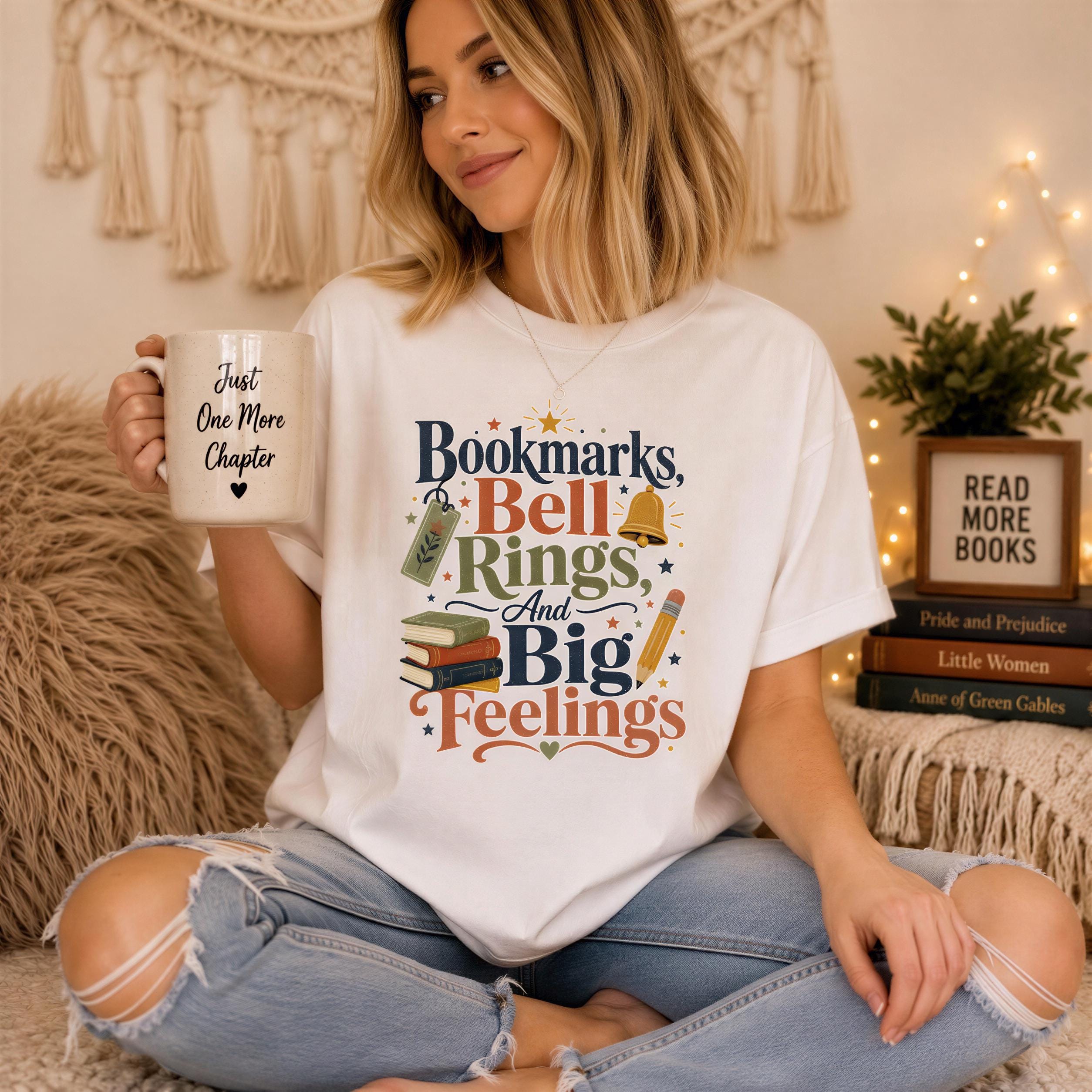A woman sitting on the floor, holding a mug with a printed design on it, and surrounded by books and decorations.