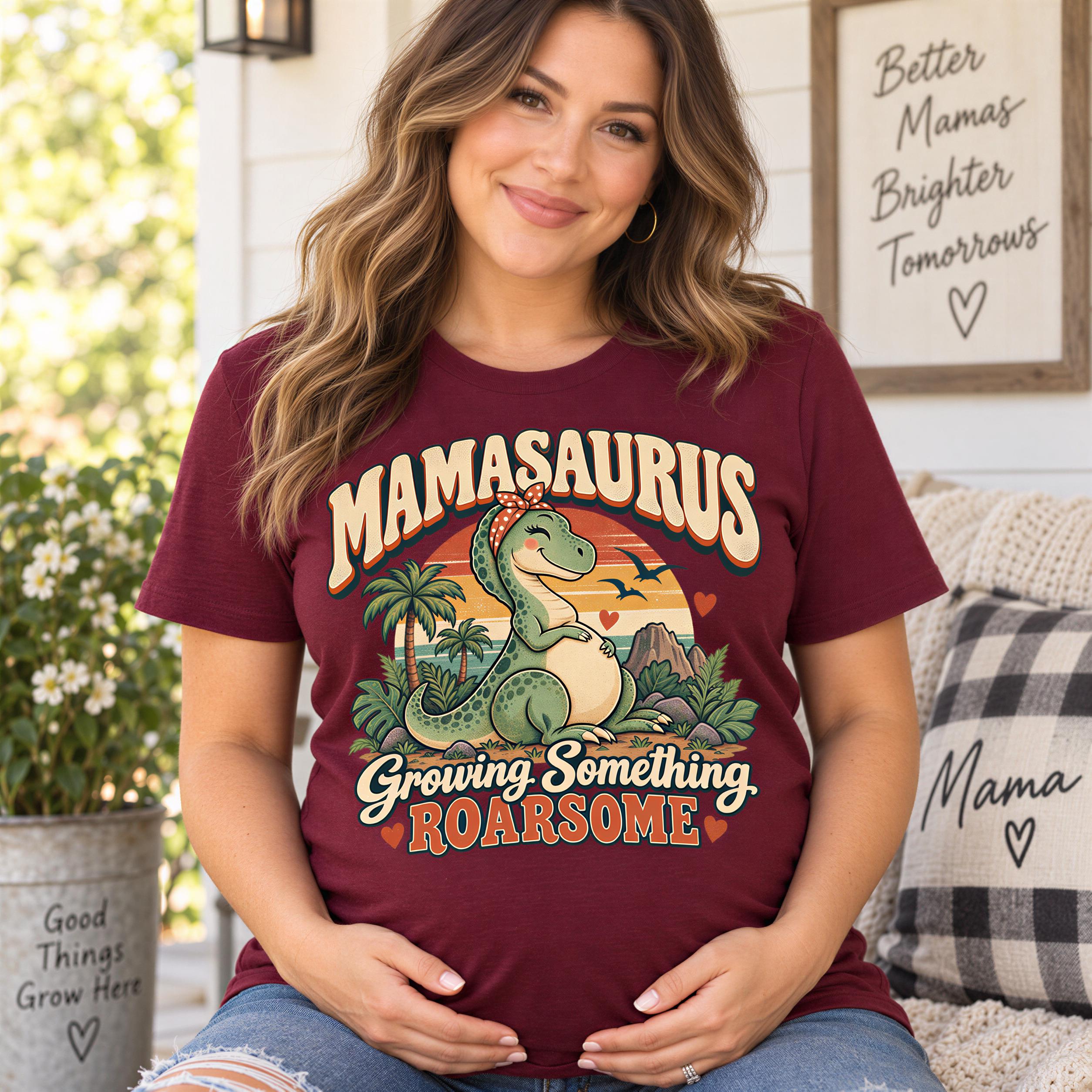 A woman wearing a maroon t-shirt with a graphic of a dinosaur and the text "Mamasaurus Growing Something Roarsome" is sitting on a porch.