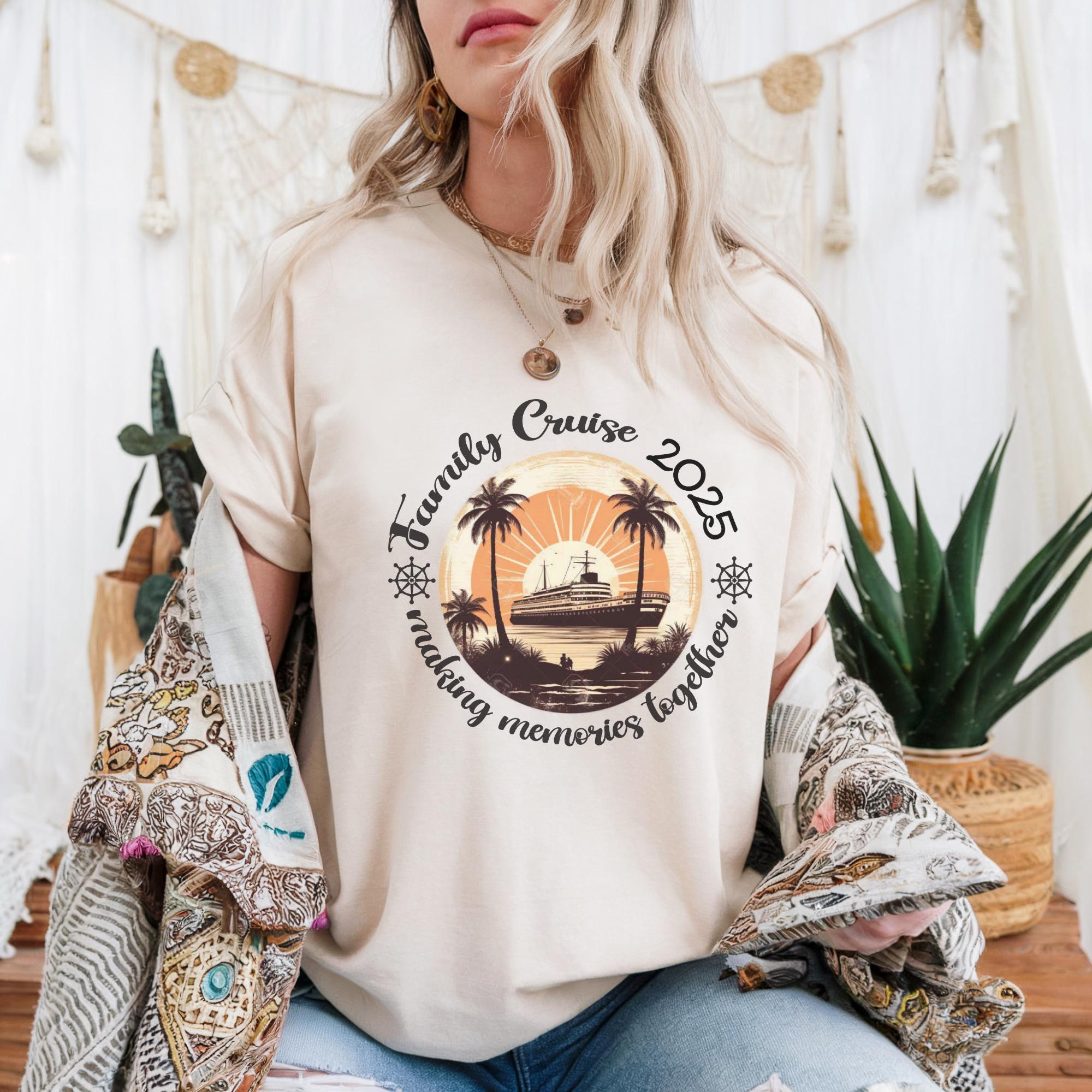 A woman wearing a white t-shirt with a graphic design of a cruise ship and palm trees, along with the text "Family Cruise 2025 making memories together".