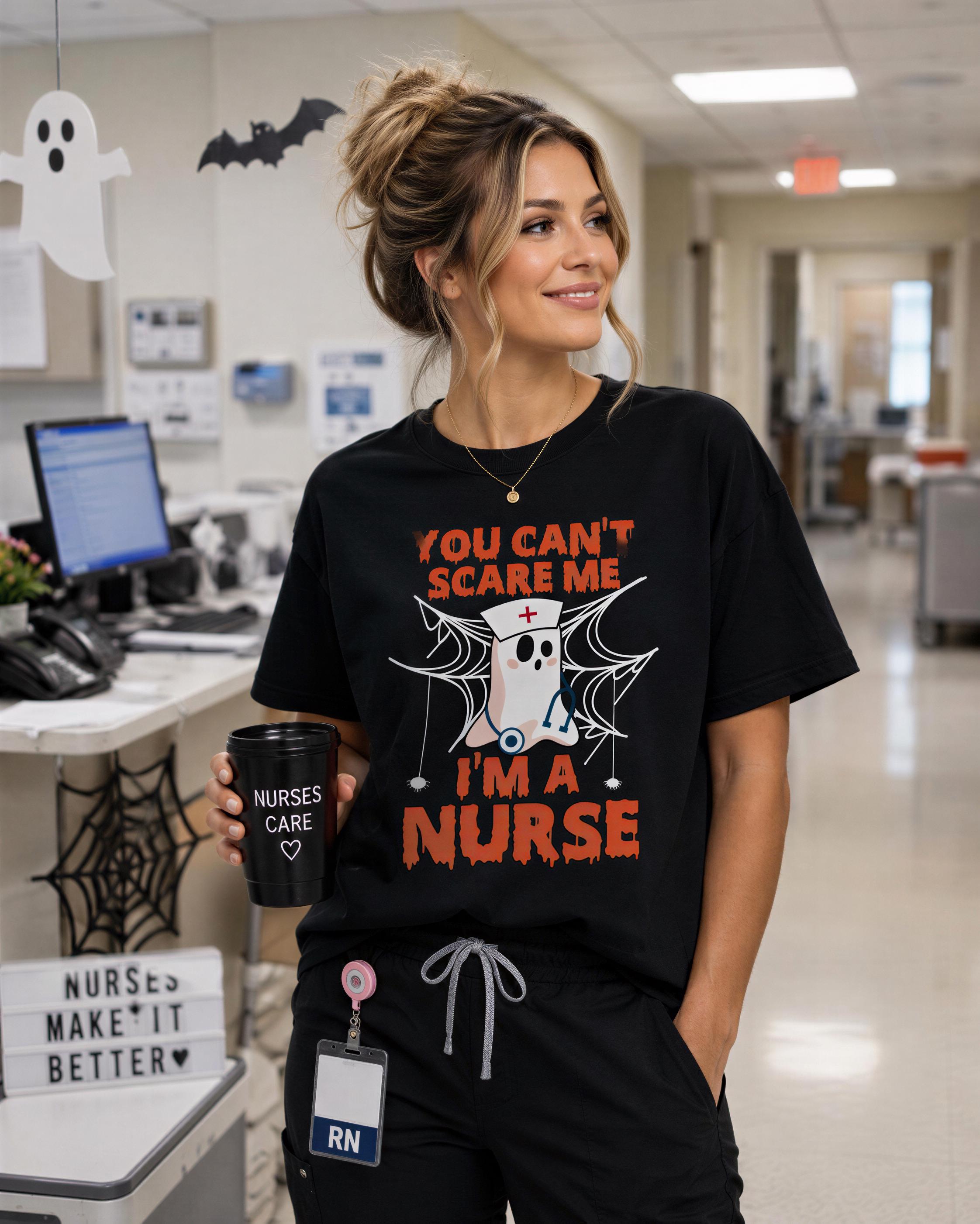 A woman wearing a black t-shirt with a Halloween-themed design and holding a coffee mug stands in a hospital setting.
