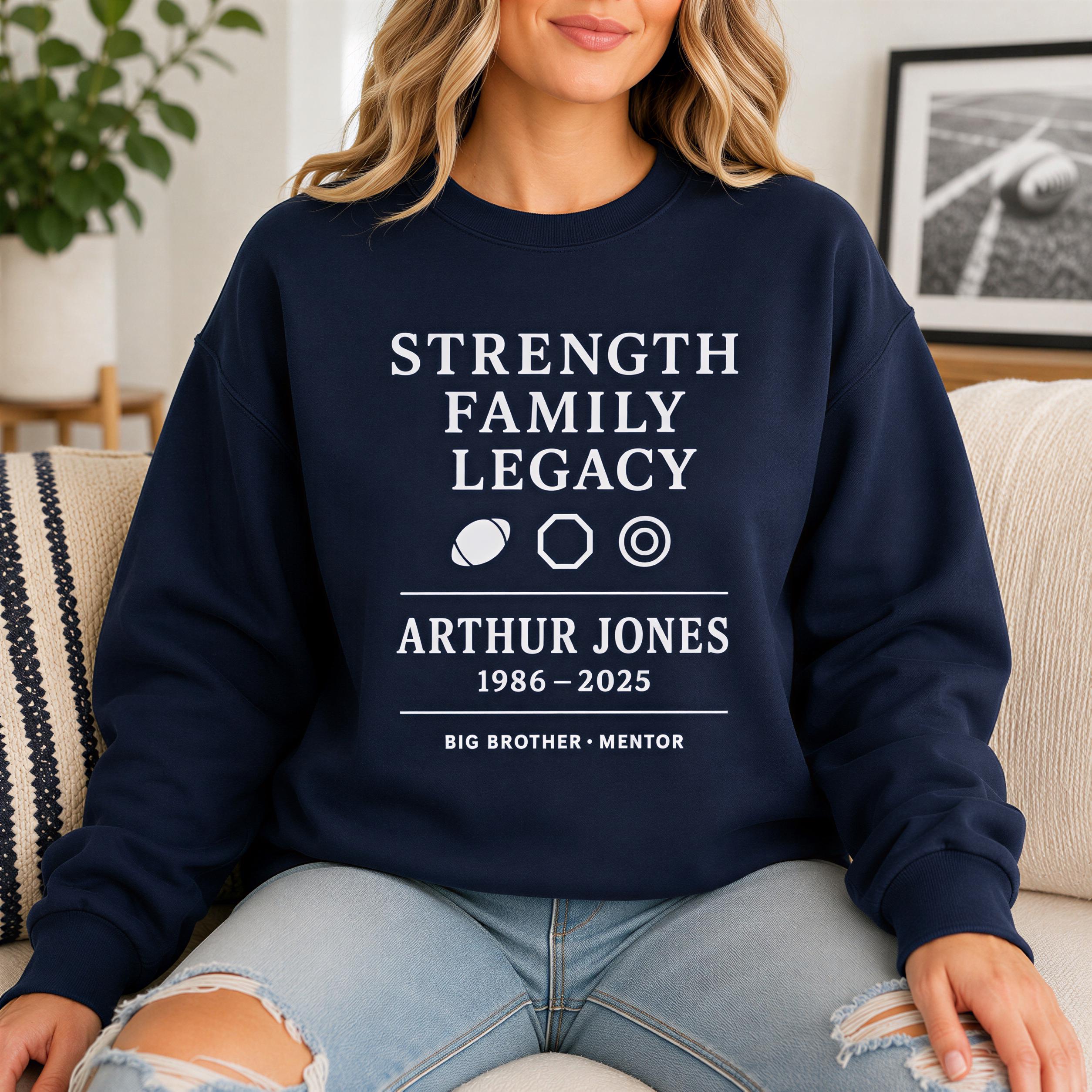 A woman wearing a navy blue sweatshirt with text and graphics printed on it.