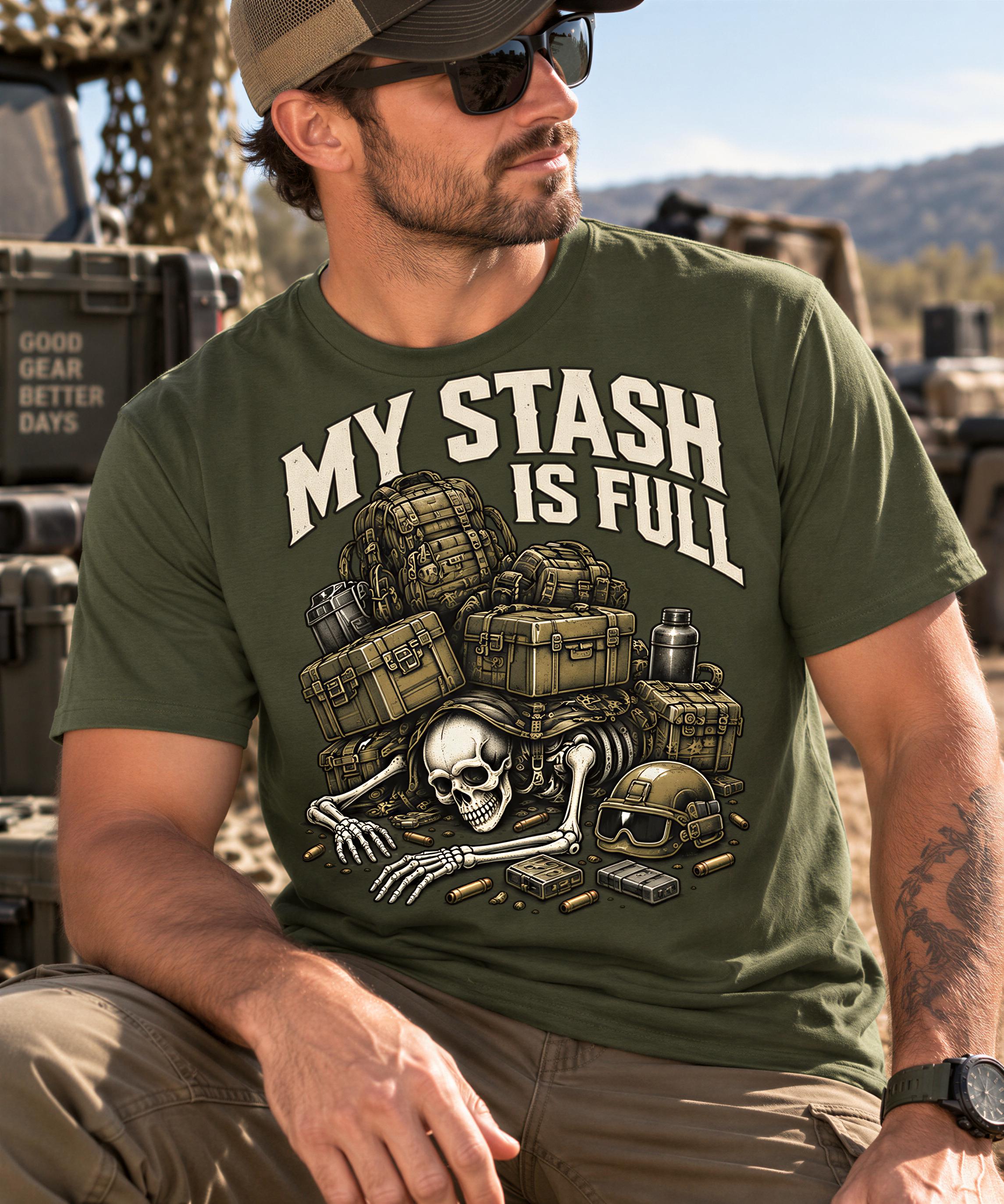 A man wearing a green t-shirt with a graphic design of a skeleton surrounded by various military equipment and the text "MY STASH IS FULL".