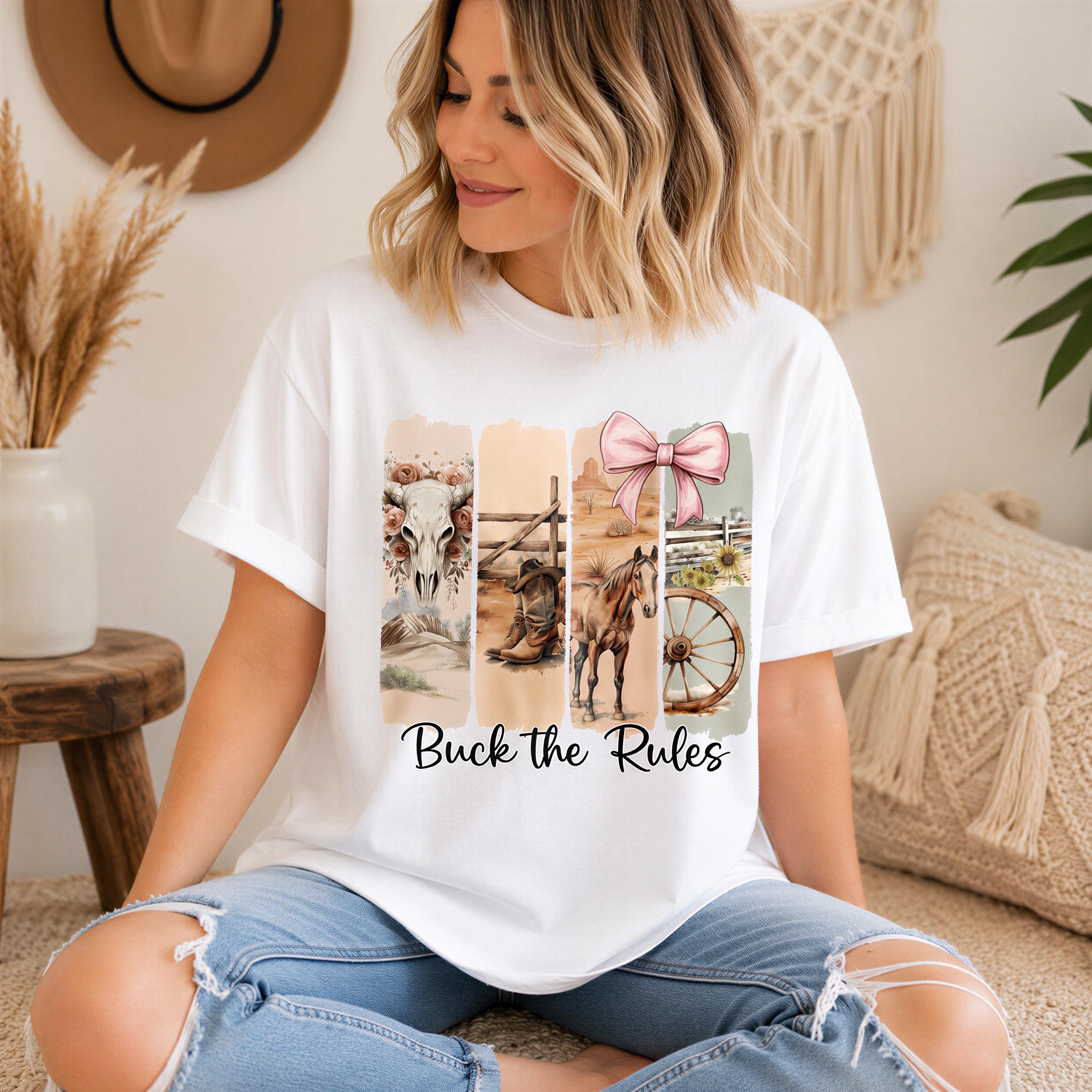 A woman wearing a white t-shirt with a graphic design of a horse and a bow, sitting on a couch in a room with various decor items.