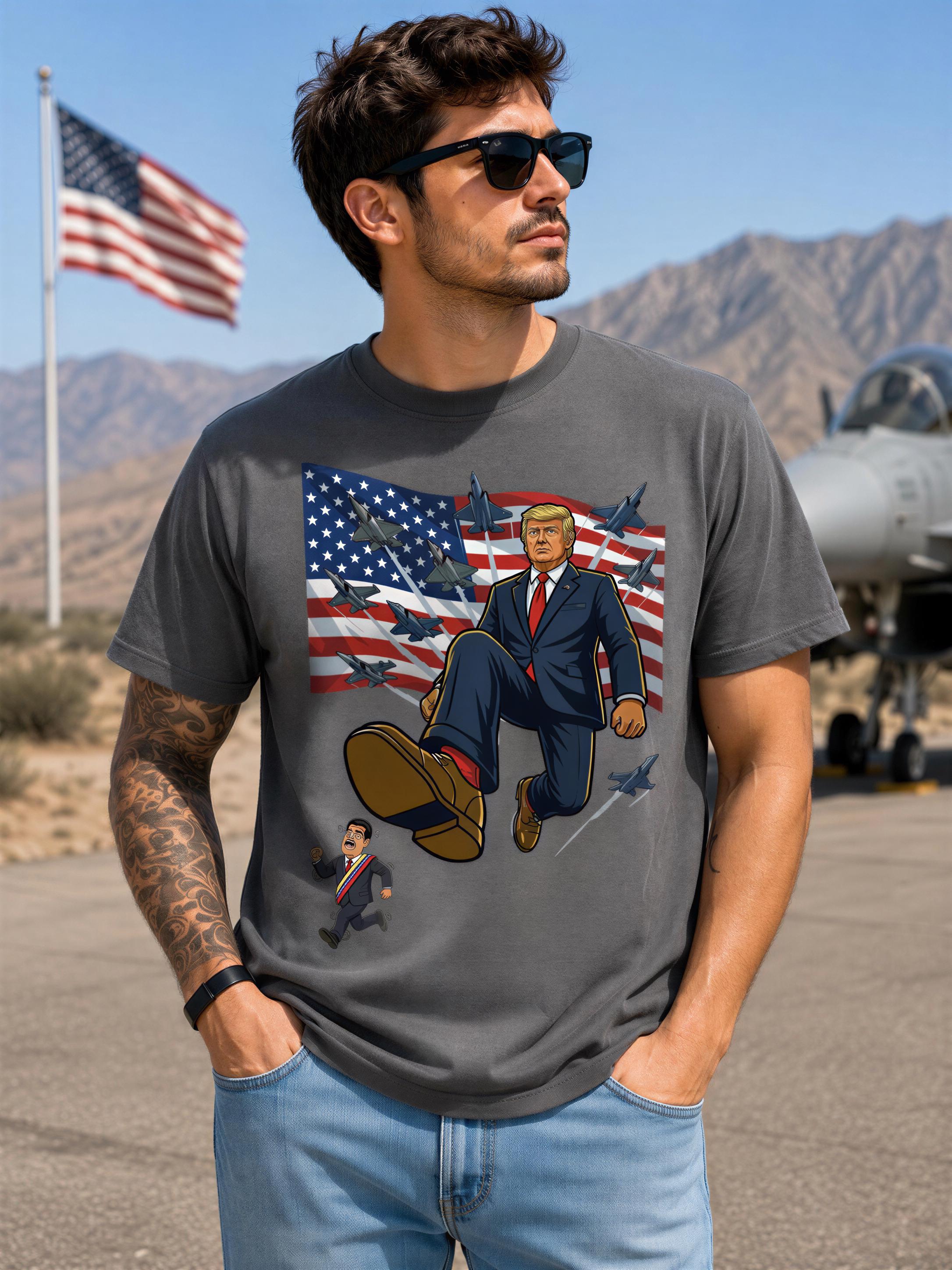 A man wearing a t-shirt with a graphic design depicting a man in a suit and tie standing in front of an American flag, with a military aircraft in the background.