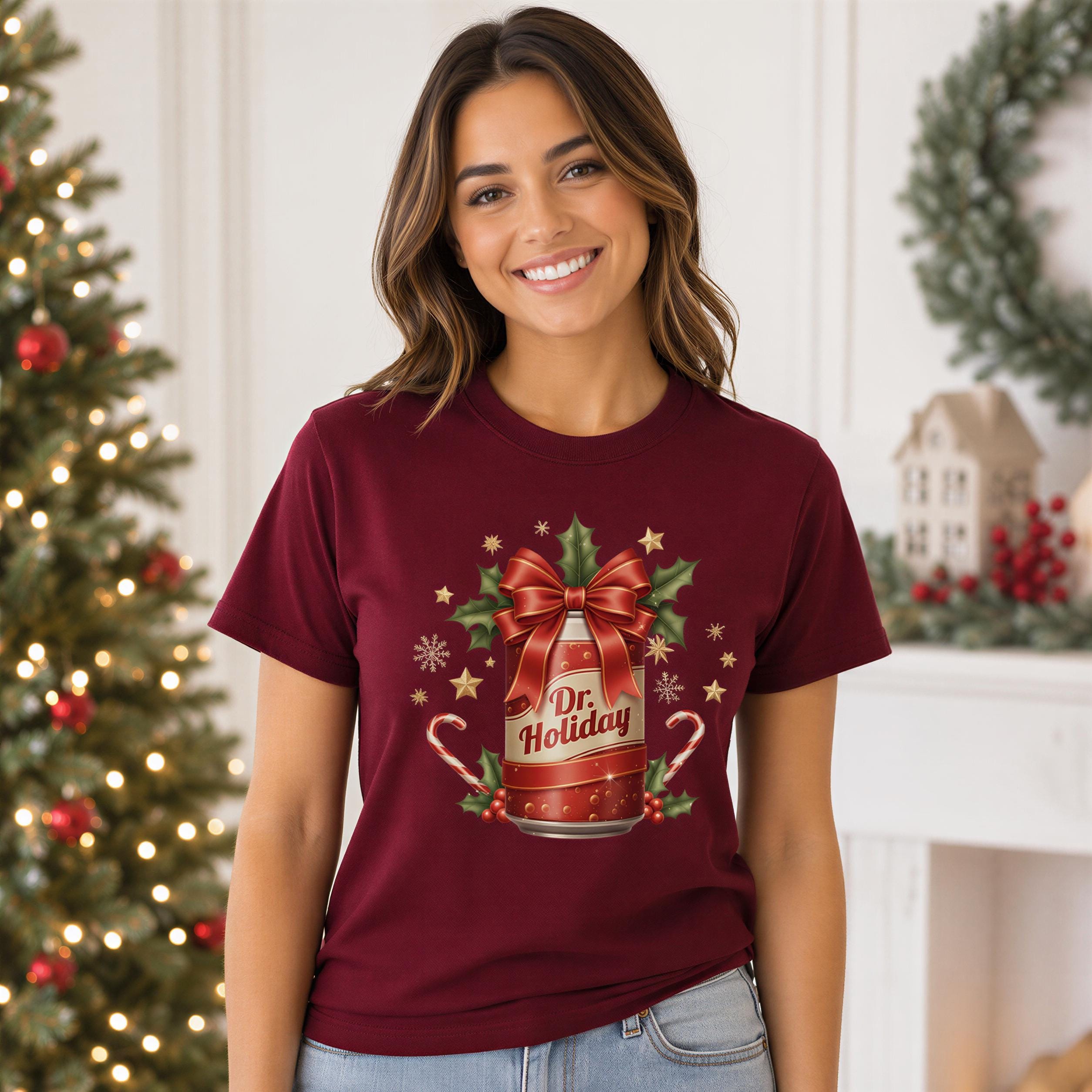 A woman wearing a burgundy t-shirt with a Christmas-themed design, including a bottle with a bow and the text "Dr. Holiday".