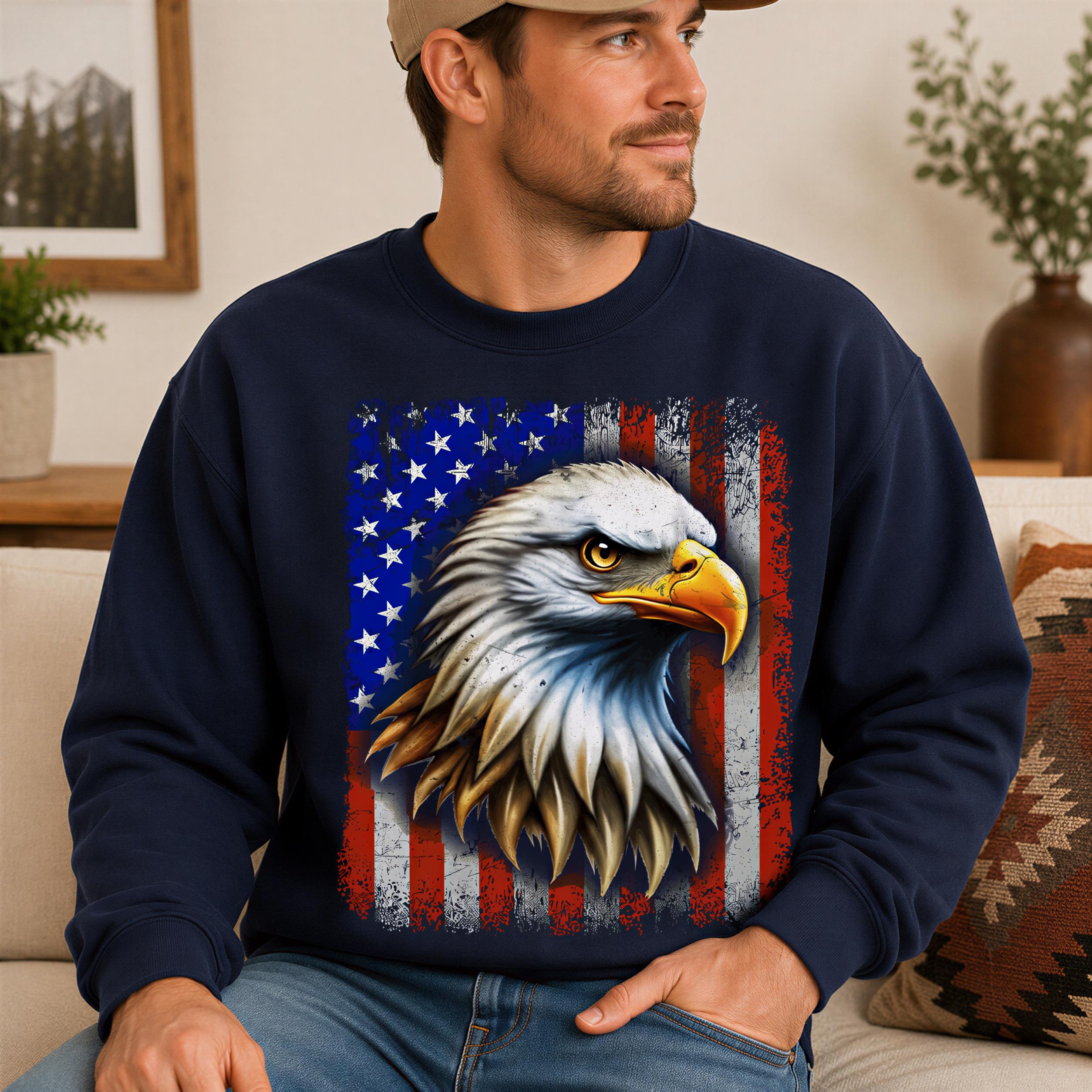 A man wearing a navy blue sweatshirt with an American eagle design is sitting on a couch.