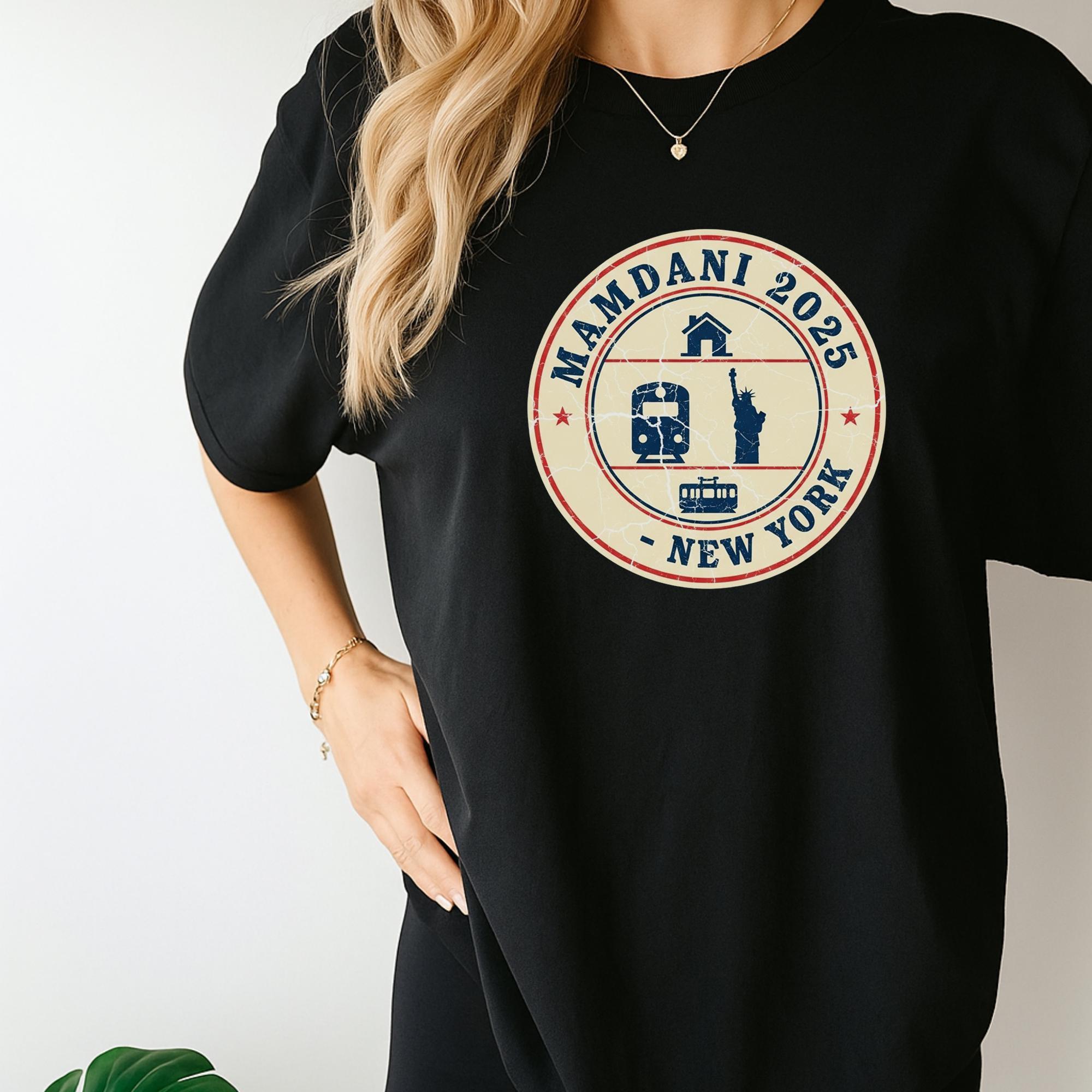 A person wearing a black t-shirt with a circular design featuring various icons and text related to New York.