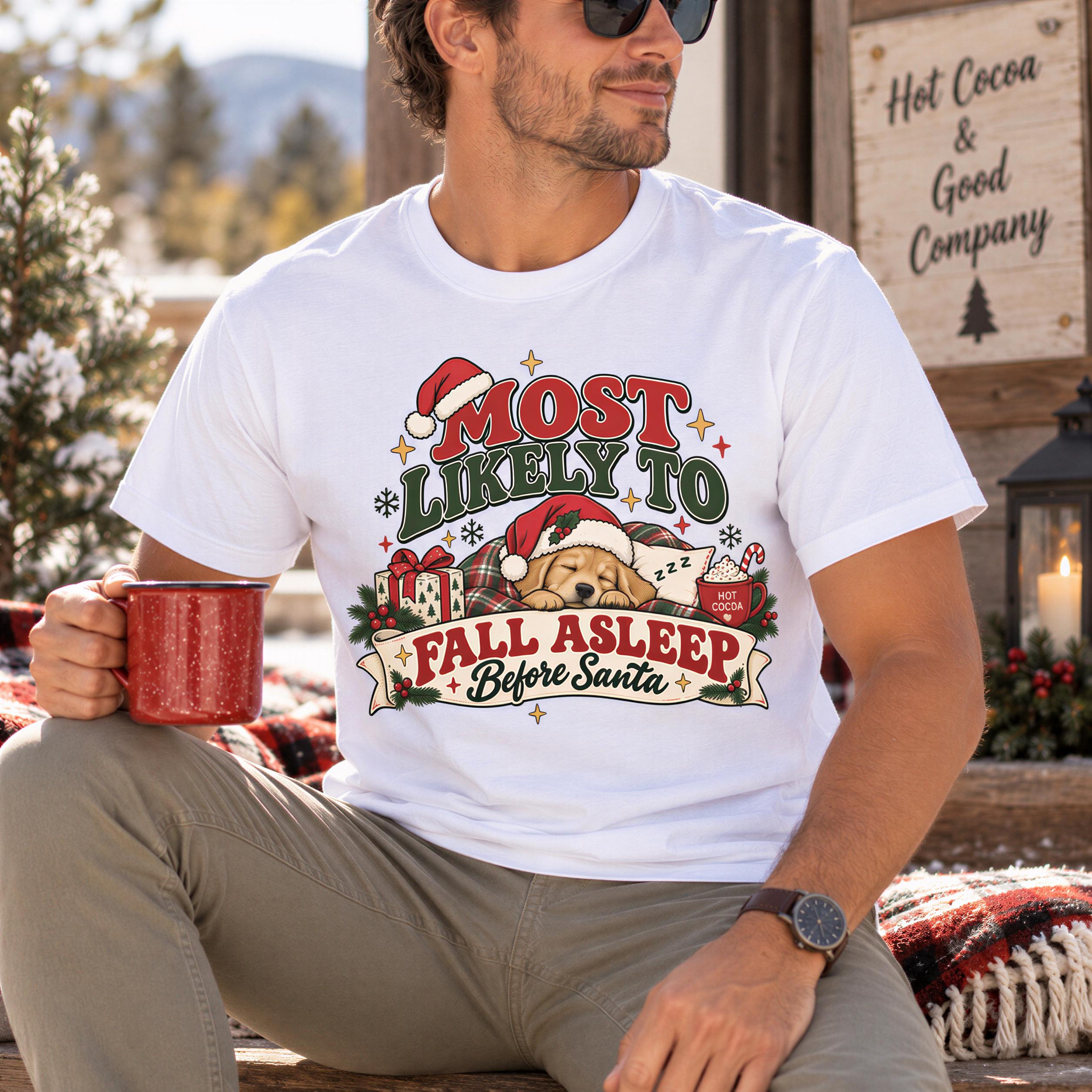 A man wearing a white t-shirt with a Christmas-themed graphic and text, sitting outdoors with a red mug in his hand.