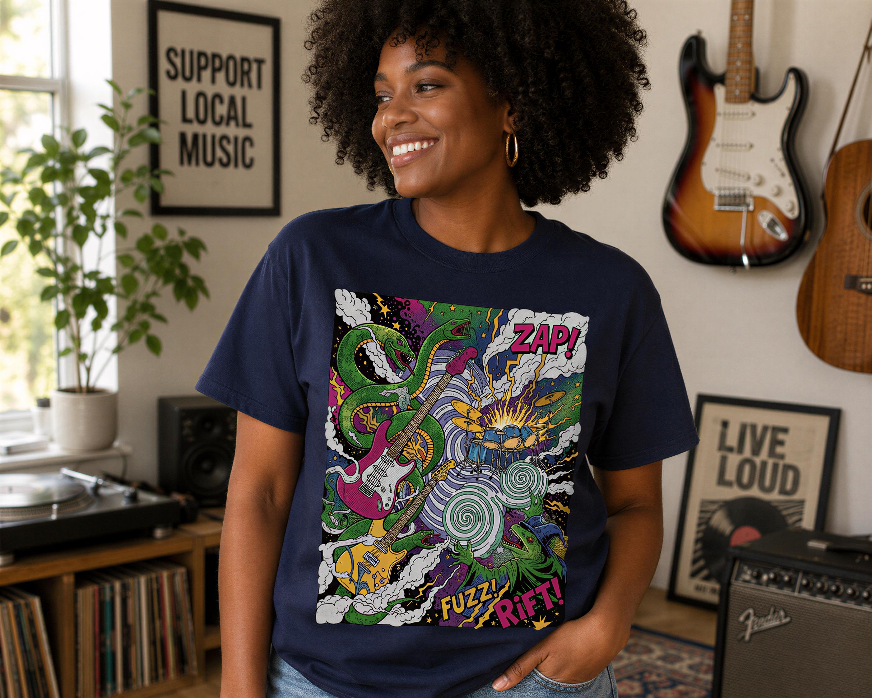 A smiling woman wearing a blue t-shirt with a colorful graphic design of a guitar and various musical elements.