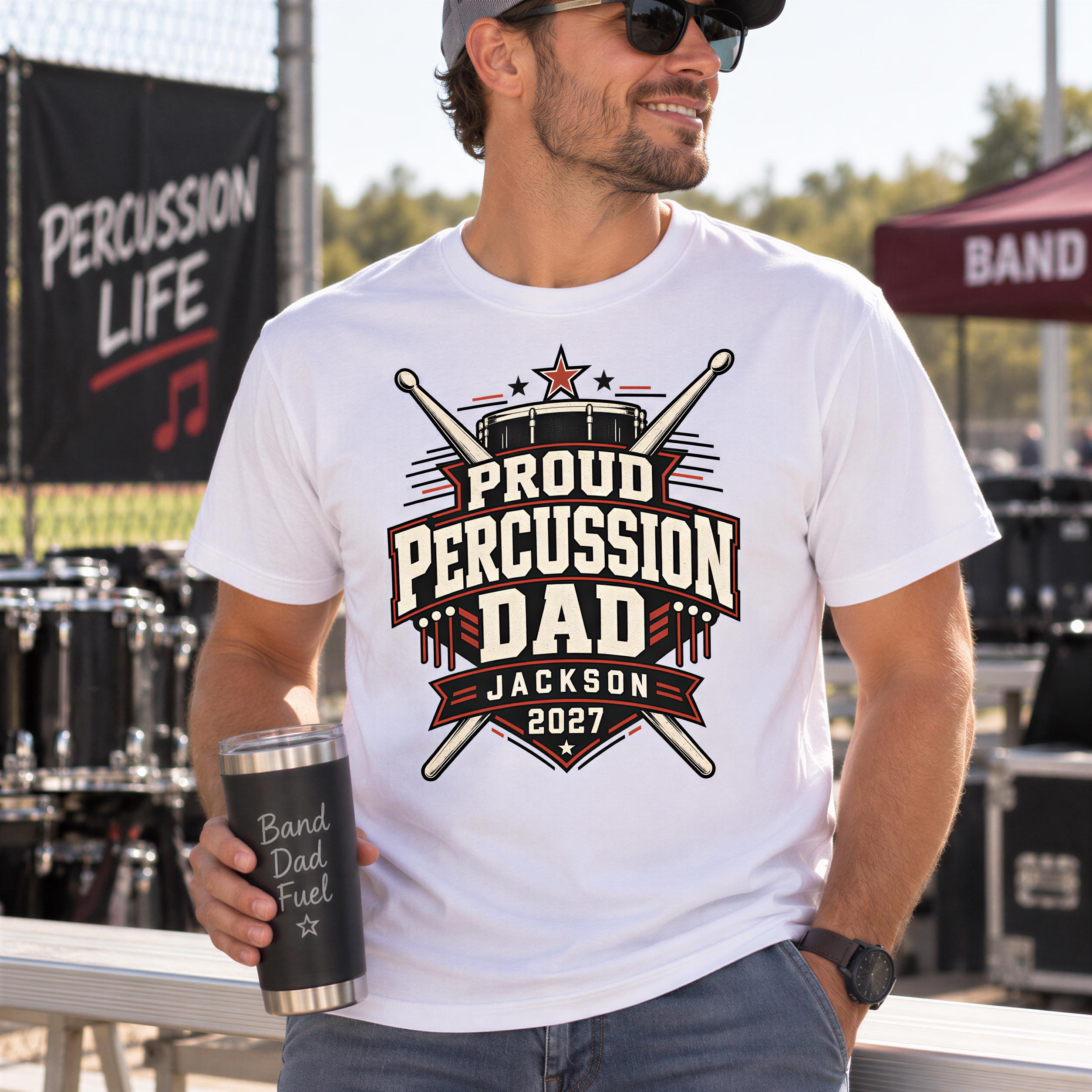 A man wearing a white t-shirt with a graphic design and holding a black tumbler with text on it.
