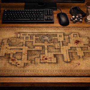 May include: A large rectangular mousepad with a detailed map design, featuring a dungeon layout with rooms and pathways. The map is printed in shades of brown and tan, with red accents. A keyboard, mouse, and other accessories are visible.