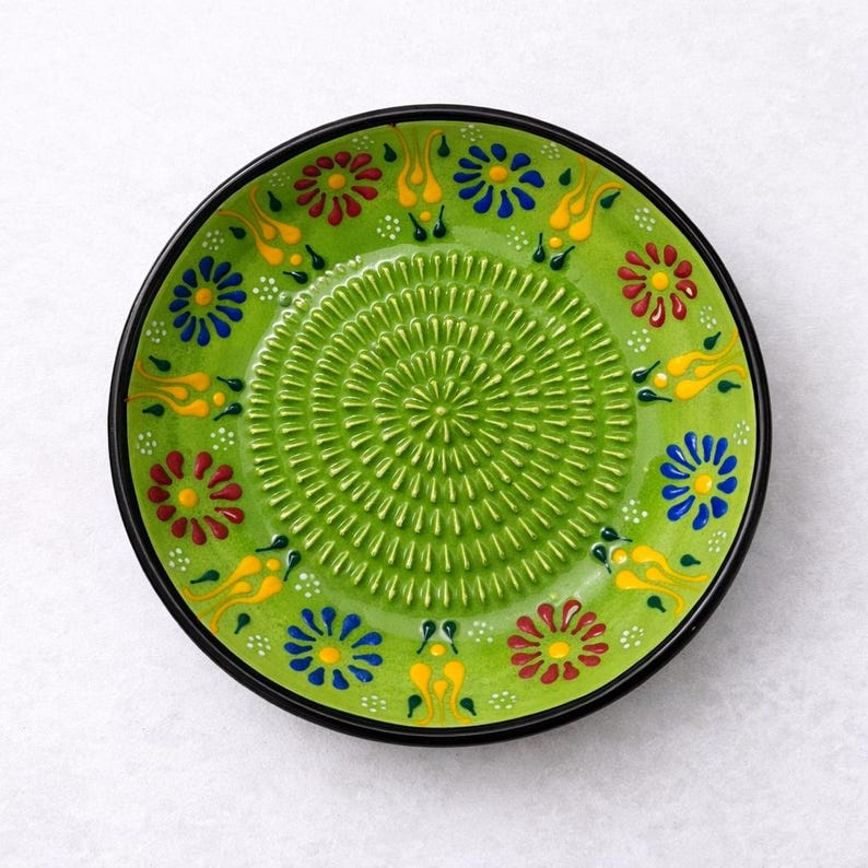 Handmade ceramic garlic grater inspired by traditional craftsmanship