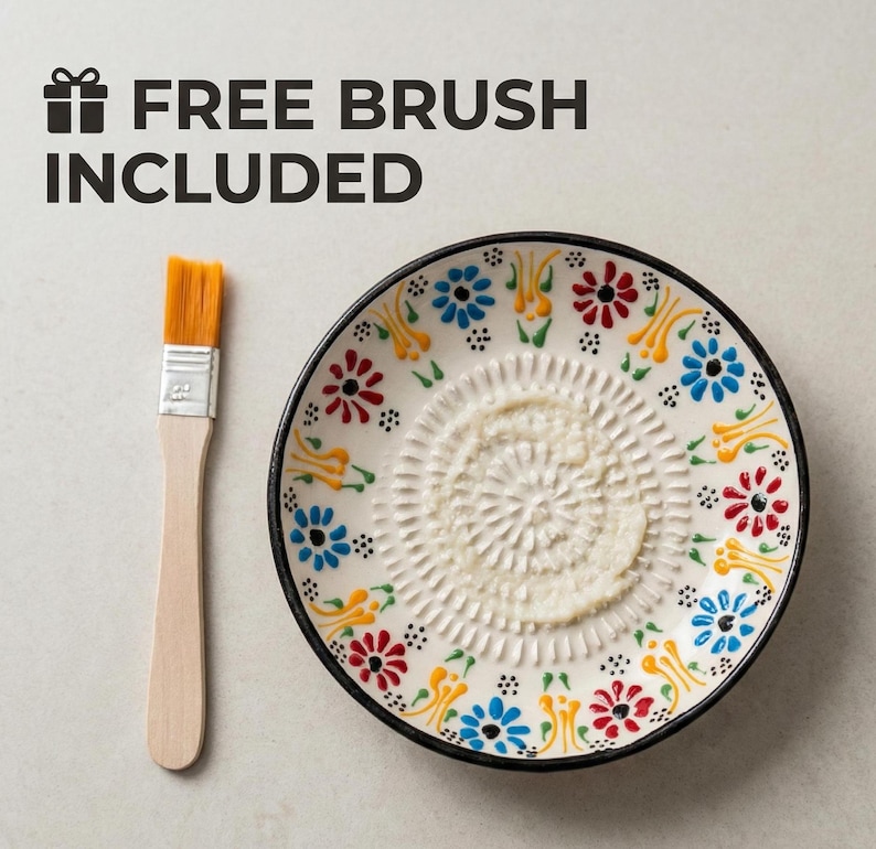 Artisan ceramic garlic grater dish with hand-painted floral design