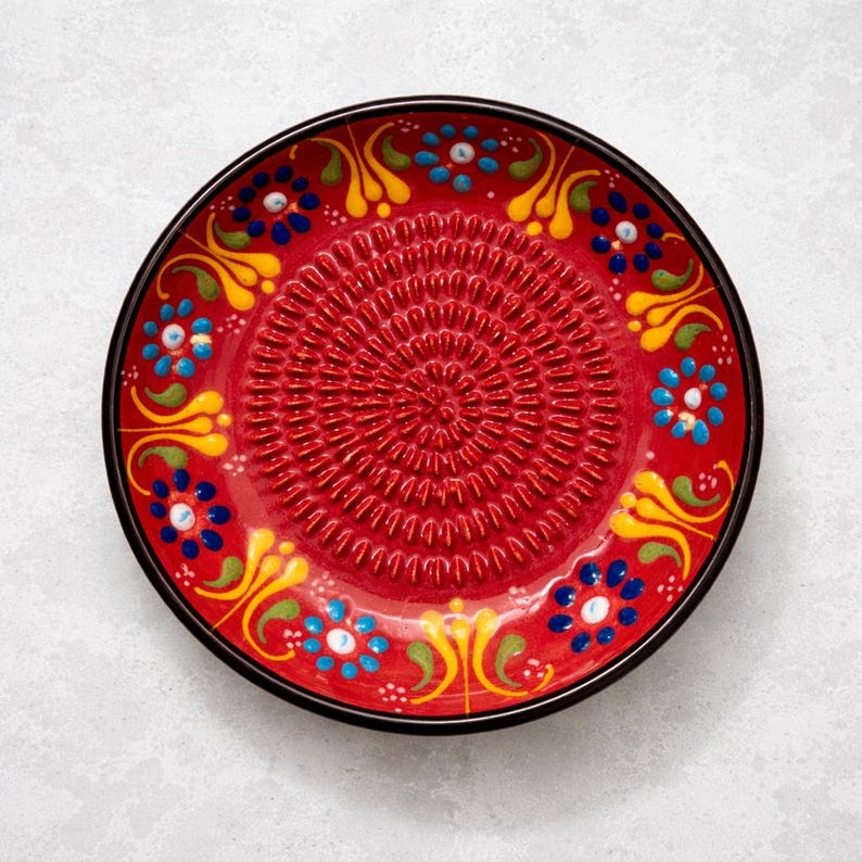 Traditional style ceramic garlic grater plate for kitchen use