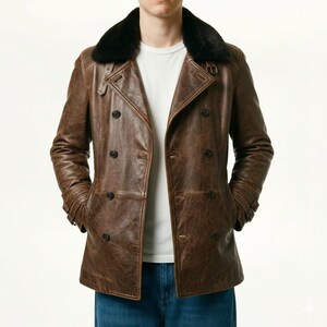 May include: A brown leather jacket with a black faux fur collar. The double-breasted coat has dark buttons and a distressed finish. The jacket features a classic pea coat design with a notched lapel and side pockets. The model is wearing a white t-shirt and blue jeans.