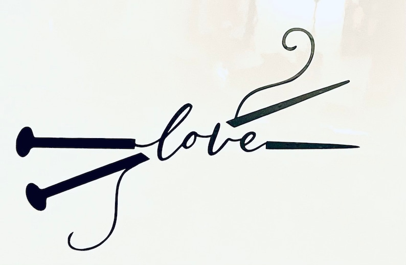 May include: Black metal art piece featuring knitting needles and a crochet hook forming the word "love" in cursive script. The needles and hook are set against a white background, creating a minimalist design.