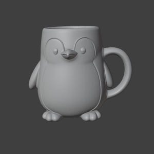 May include: A gray ceramic mug shaped like a penguin. The mug features a penguin's face, wings, and feet. The handle is a curved loop attached to the side. The mug is designed with rounded edges and a smooth surface.