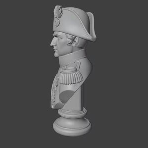 May include: A gray bust of a historical figure, wearing a bicorne hat and military-style jacket with epaulettes. The bust is mounted on a pedestal base, and the overall design is a classical style.