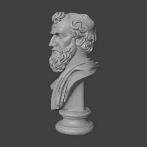 May include: A gray bust of a bearded man with curly hair and a draped garment. The sculpture is set on a pedestal base. The bust is a classical art piece.