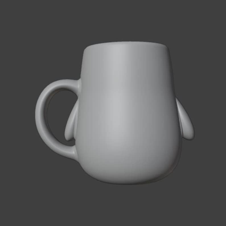 May include: A gray ceramic mug with a rounded body and a curved handle. The mug has two small, rounded protrusions on the sides, giving it a penguin-like appearance. The mug is set against a gray background.