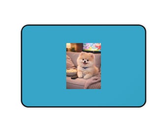 Alfombrilla de escritorio con cachorro Pomerania sonriente / Fondo azul