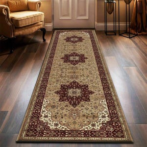 May include: A long, rectangular rug with an ornate, traditional design. The rug features a beige background with a repeating pattern of burgundy floral medallions and borders. The rug is placed on a hardwood floor, adding warmth and style to the entryway.