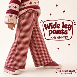 May include: Wide leg pants with a red and white gingham check pattern. The text on the image reads Wide leg pants Kids 6M-14Y and The Kraft Depot PDF Pattern. The pants are worn with a striped knit sweater and red sneakers.
