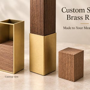 May include: Custom square brass risers featuring a combination of dark wood and brushed brass metal. The display shows a cutaway view of the square brass sleeve with a wooden insert, a full brass-sleeved wooden post, and a solid wooden block.