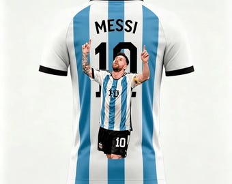 May include: A short-sleeved jersey featuring vertical light blue and white stripes. The back displays the name MESSI and the number 10 in black. A graphic of a soccer player in a matching jersey with arms raised is centered over the number 10.
