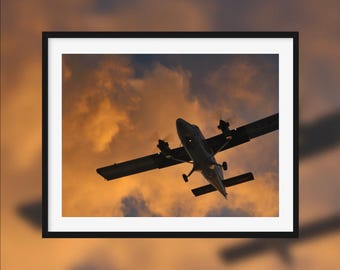 The spot -- Airplane flying at sunset [Maho, Sint Maarten]