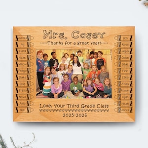 May include: A wooden picture frame with a class photo, the text "Mrs. Casey" and "Thanks for a great year!" is engraved at the top. The names of the students are listed on the sides. The text "Love, Your Third Grade Class 2025-2026" is at the bottom.