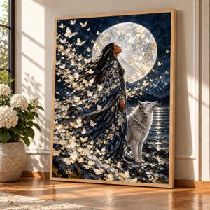 May include: A rectangular wall art print in a light wood frame depicting a person with long dark hair standing beside a white wolf near a body of water. A large full moon shines above mountains, surrounded by a swarm of white and gold butterflies.