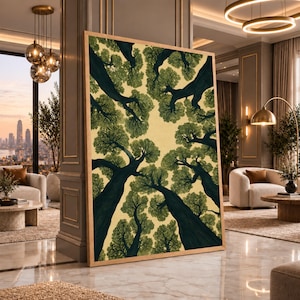 May include: A large rectangular framed wall art piece featuring a low-angle perspective of dark green tree trunks and foliage reaching upwards against a pale yellow sky. The artwork is displayed in a room with marble floors and modern furniture.