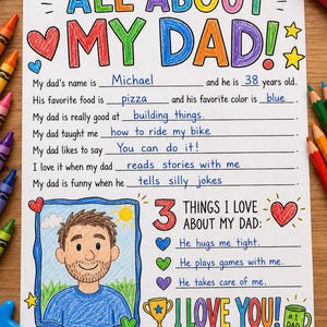 Puede incluir: Una colorida obra de arte manuscrita para el Día del Padre, titulada "All About My Dad". La obra incluye un retrato, espacios para rellenar y el texto "I Love You!". El padre se llama Michael y tiene 38 años. La obra está firmada por Emma, de 7 años.