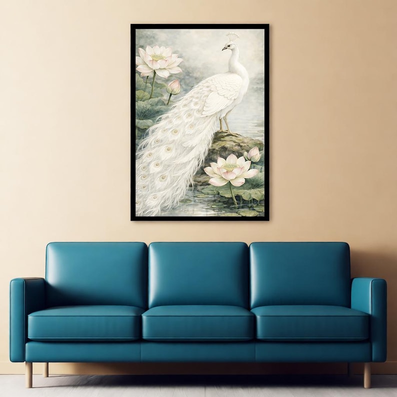 May include: A framed watercolour print depicting a white peacock with a long, flowing tail, perched on a rock. The artwork features white lotus flowers and green lily pads in a serene, natural setting. The peacock is the focal point.