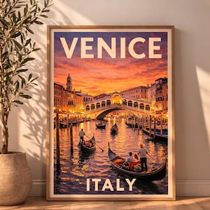 May include: Framed travel poster of Venice, Italy, featuring the Rialto Bridge and gondolas on the Grand Canal at sunset. The poster has the word "VENICE" at the top and "ITALY" at the bottom in white text.