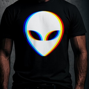May include: Black t-shirt with a white alien head design, outlined in red, blue, and yellow for a 3D effect. The alien has large, oval eyes. The t-shirt is a crew neck style.