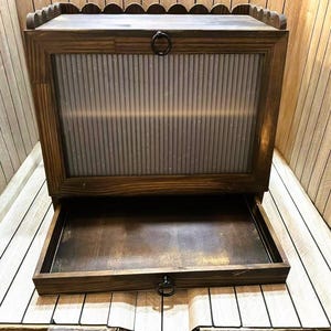 May include: A set of three ceramic mugs with a speckled, matte finish. The mugs are in shades of cream, light gray, and dark gray. Each mug has a simple, minimalist design, perfect for coffee or tea.