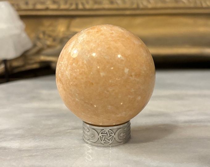 Sunstone Crystal Sphere on Triple Moon Pentacle Stand