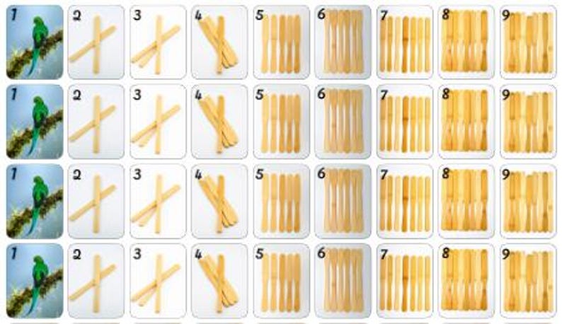 May include: A collection of playing cards featuring various images and numbers. The cards display a green parrot, crossed sticks, and bundles of wooden sticks. Numbers 1 through 9 are represented across the cards.