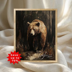 May include: A framed art print featuring a brown bear in a dark forest setting. The bear is the focal point, rendered in shades of brown and tan. The artwork is signed "Paul Lewis Prints". A red starburst graphic indicates a discount.
