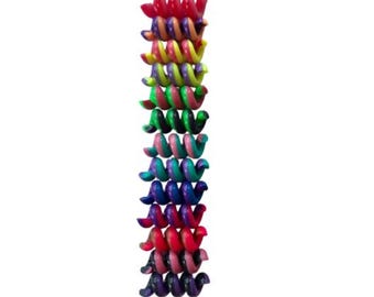 Tubos para audífonos con giros en dos tonos de colores