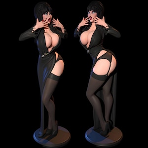 以下が含まれることがあります： 黒い髪、赤い口紅、黒いドレスを着た女性の2つの同一の黒い像。像は丸い台座の上に立っています。女性は顔の近くに手を置いてポーズをとっています。