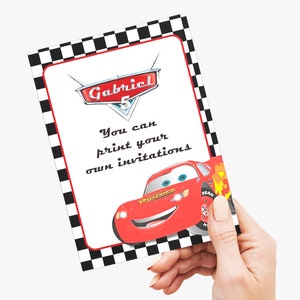 May include: A red and white printable invitation card with a black and white checkered border. The card features a cartoon image of Lightning McQueen from the Disney Pixar movie Cars. The text on the card reads "Gabriel 5 You can print your own invitations".